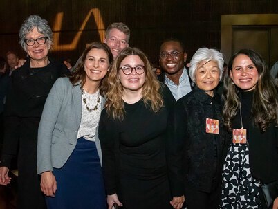 7 guests at the LAF Annual Benefit pose for a photo