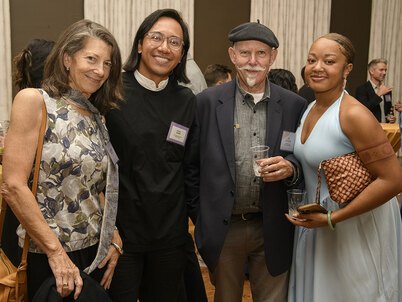 A group of four LAF Annual Benefit attendees smiling