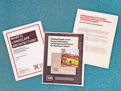 Three Frameworks reports arranged on an aqua-colored backdrop