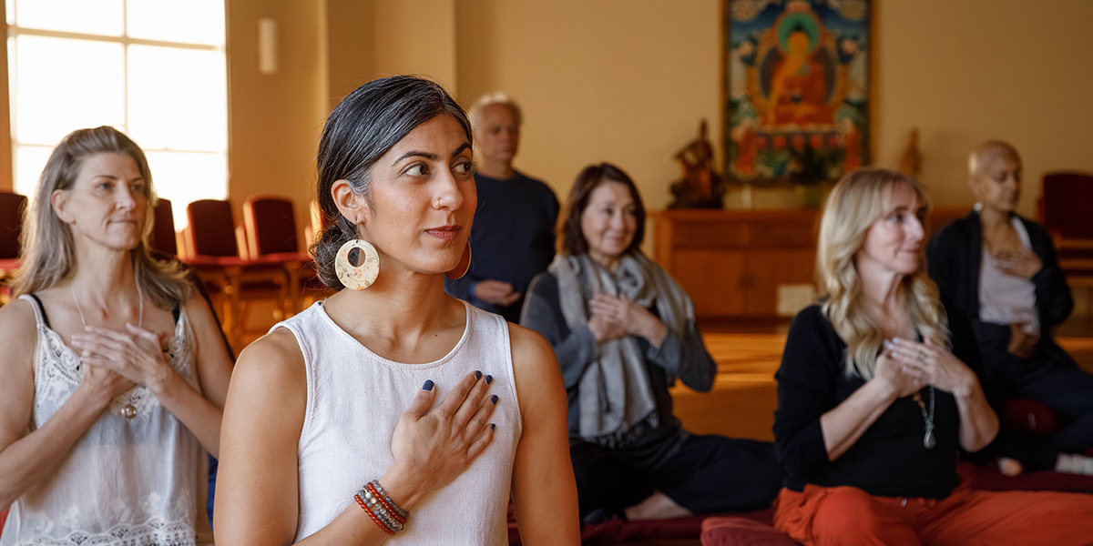 Spirit Rock Meditation Center - People holding heart while meditating