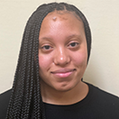 Jakobi Johnson smiles